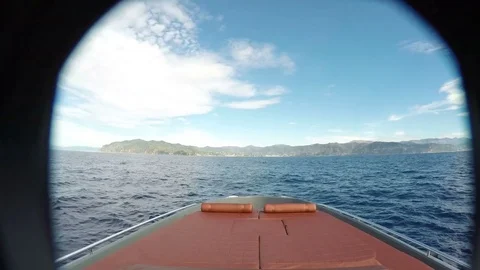 Hand fixing action camera on a maxi rib Stock Footage 71004638