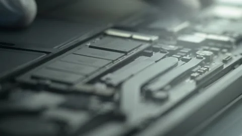 Hand Fixing and Cleaning Computer Stock Footage 137549962