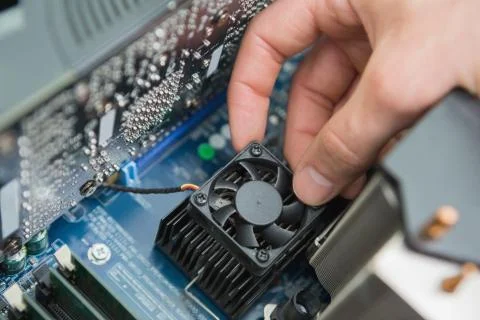 Hand fixing processor fan 스톡 사진
