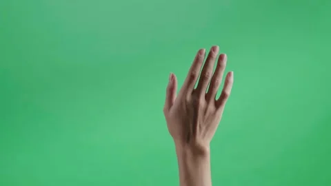 Hand Flick Of Left On Green Screen Background Video stock 191540584