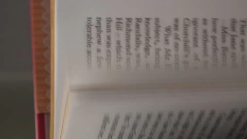 Hand flipping through a book Stock Footage 140313998