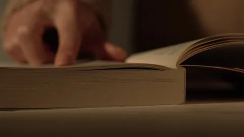 Hand Flipping Through Open Book. Stock Footage 258571615