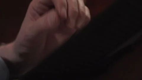 Hand flips notebook pages as reader reviews written notes Stock Footage 327082261