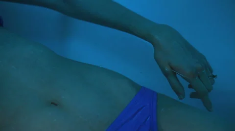 Hand floating sensory deprivation tank Stock Footage 45592007