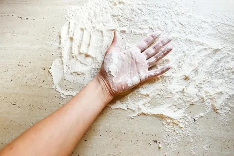 Hand in flour Stock Photos
