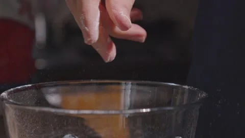Hand flour slow motion Stock Footage 149944892