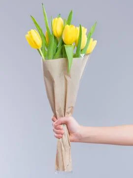 Hand with flowers Stock Photos