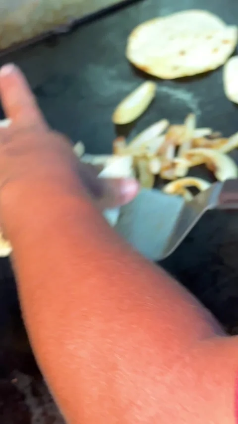 Hand Folding Taco on Griddle Stock Footage 318749346