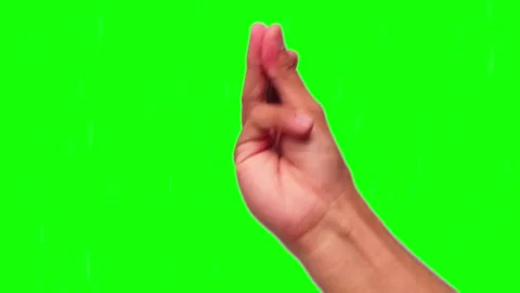 Hand forms a peace sign against a vibrant green background Video stock 295537882