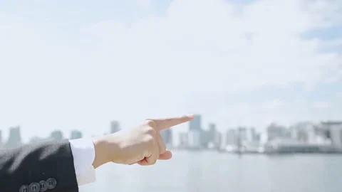 Hand in front of the city. Video stock 161546477
