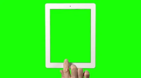Hand in front of green screen operating a tablet Stock Footage 20590806