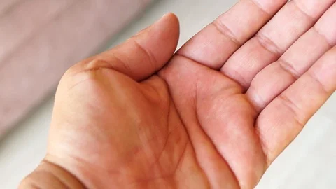 Hand full of pills Stock Footage 104353039