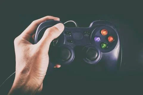 Hand on gamepad Stock Photos