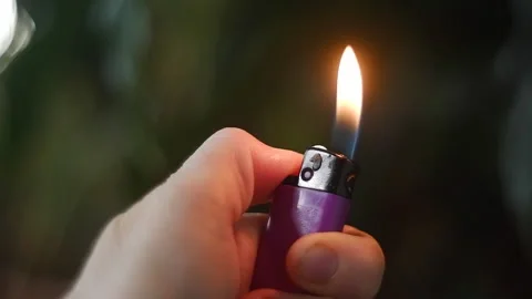 Hand with a gas lighter, close up Stock Footage 172449684