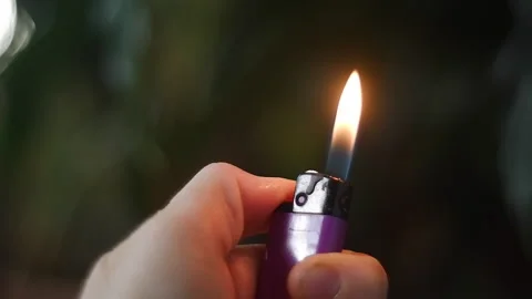 Hand with a gas lighter, close up Stock Footage 174718000