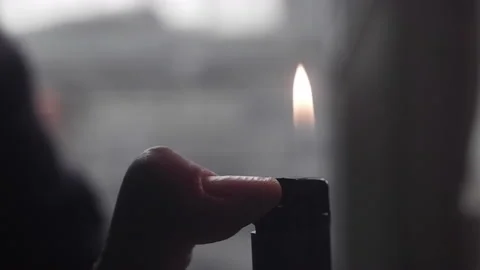 Hand with a gas lighter, close up Stock-Footage 175399551