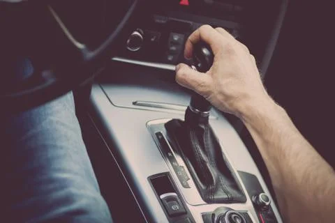 Hand on gear stick Stock Photos