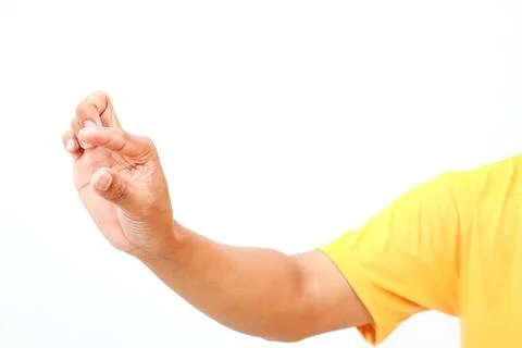 Hand gesture displaying small size concept in front of plain white background Stock Photos