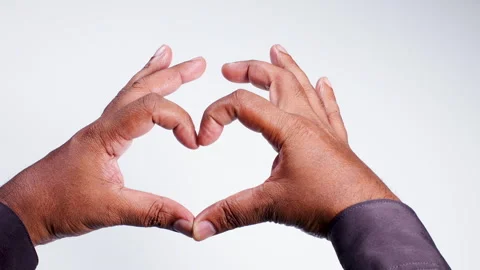 Hand Gesture Heart Symbol made by an Indian man Stock Footage 248699824
