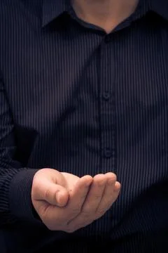 Hand gesture holding ask help Stock Photos