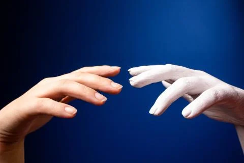Hand gesture. Human gesture. Two hands are drawn to each other on a blue Stock Photos