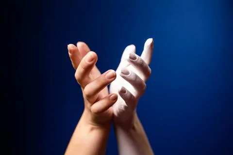 Hand gesture. Human gesture. Two hands freely touch with their palms to each Stock Photos