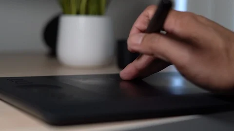 Hand gesture scrolling  on the tablet touch pad Stock Footage 102510063