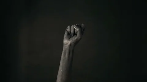 Hand gestures. Black painted woman's hand pointing up with finger number one, Stock Footage 100681245