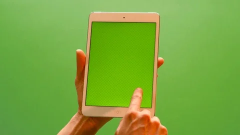 Hand gestures on modern tablet with green screen. Production proven tracking mar Stock Footage 91523982