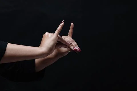 Hand gestures with two hands isolated on black background 库存照片