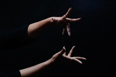 Hand gestures with two hands isolated on black background Stock Photos