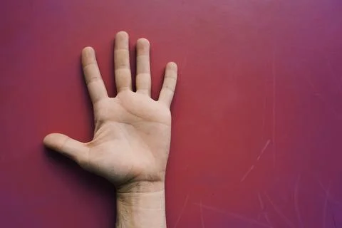 Hand gesturing on the wall Stock Photos