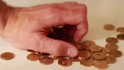 Hand getting golden coins 스톡 동영상 73506957