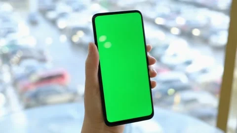 Hand of girl using smartphone with chroma key in the shopping center. Stock Footage 154074820