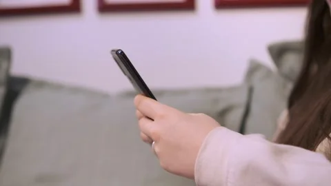 Hand of girl using texting mobile phone or chat. Close up of woman hand Stock Footage 182243202