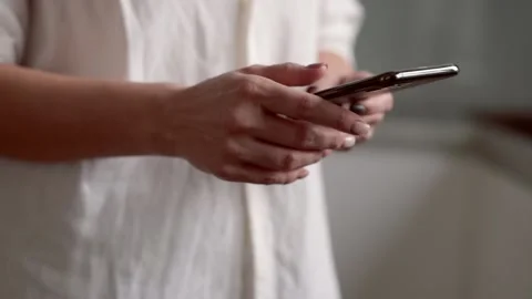 Hand girl using texting mobile phone or chat. Close up of woman hand Stock Footage 233881026