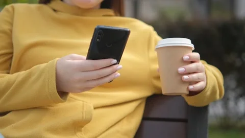 Hand of girl using texting mobile phone or chat. Close up of woman hand 4K Video stock 252203870
