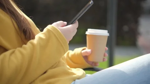 Hand of girl using texting mobile phone or chat. Close up of woman hand 4K Stock Footage 253239867