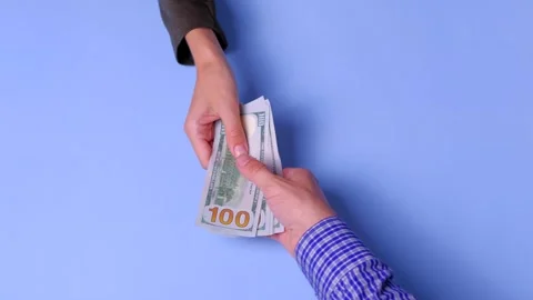 Hand give a pack of new 100 dollar bills. Video stock 159225116