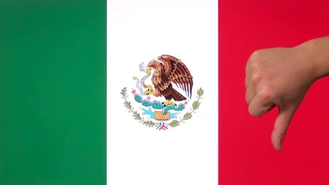Hand giving thumb down with Mexico flag disapproval gesture with copy space Видео 84786233
