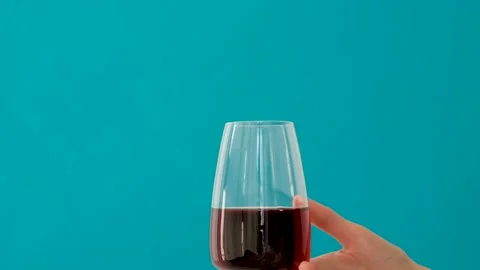 Hand with glasses of red wine Stock Footage 136237977