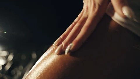 Hand glides over the body Stock Footage 128172455