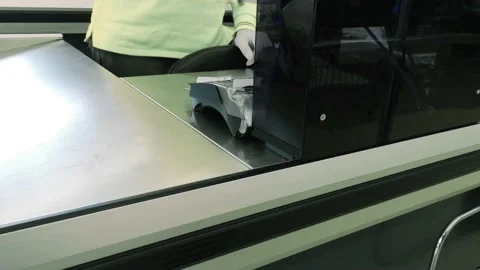 Hand in gloves enter pin code through pos terminal in market Stock Footage 130346072