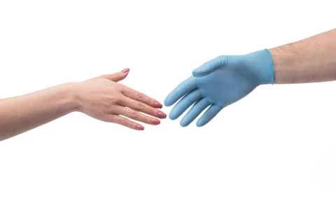 Hand in gloves shaking hand without gloves Stock Photos