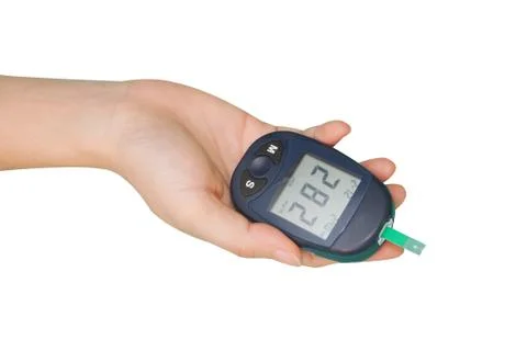 Hand with glucometer Stock Photos