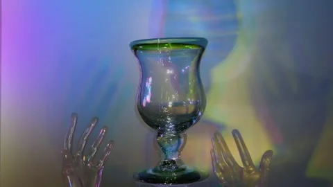Hand Goblet: Waves of Color in Moving Shadows Stock Footage 302479756
