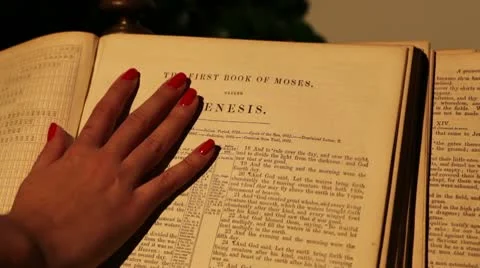 Hand going down a very old bible. Stock-Footage 10731649