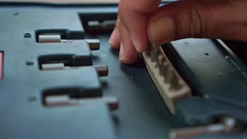 Hand grabbing screwdriver bit set from case, hardware tool storage, Stock Footage 345870967