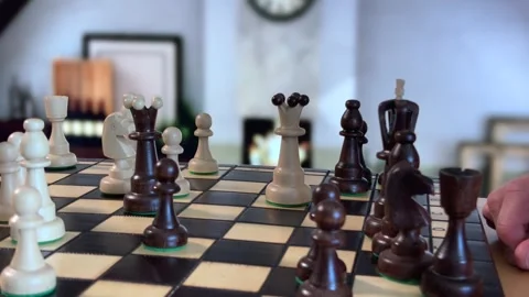 Hand Grabs Chess Piece During Game Video stock 310139197