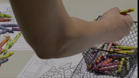 Hand grabs crayons Stock Footage 307960611